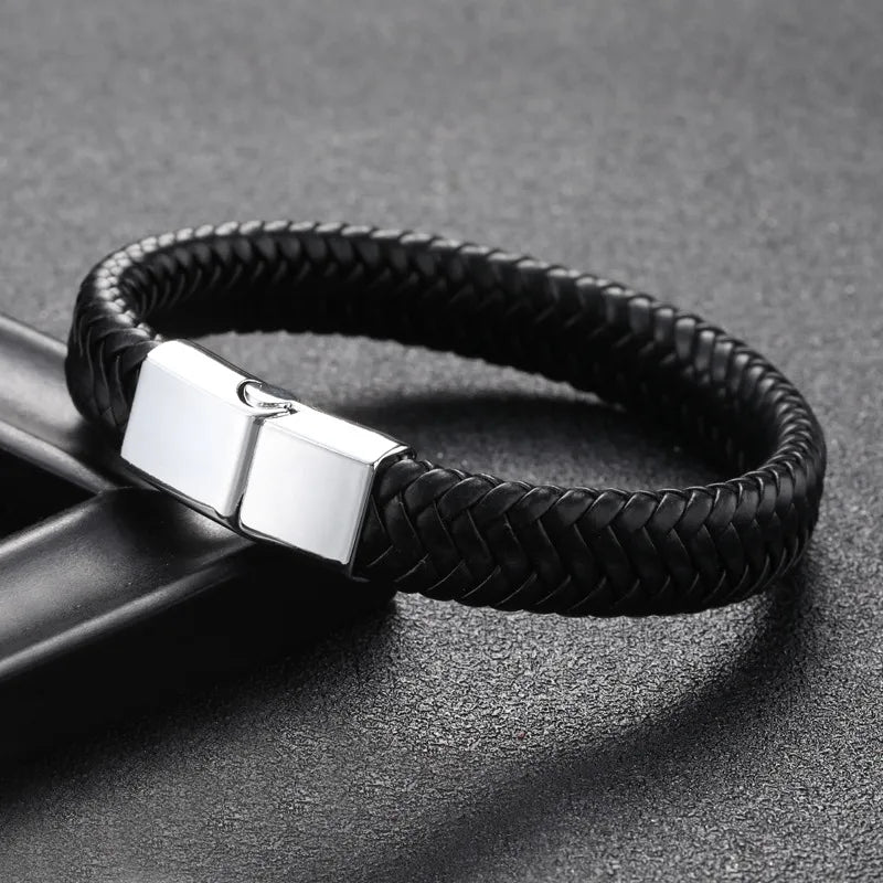 Elegant LuminaryLA minimalist black leather bracelet featuring a metal clasp, embodying a luxurious feel