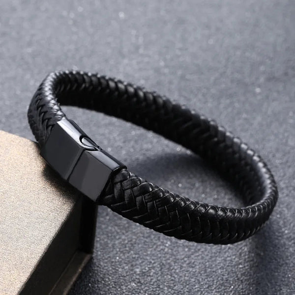 Elegant LuminaryLA minimalist black leather bracelet featuring a metal clasp, embodying a luxurious feel