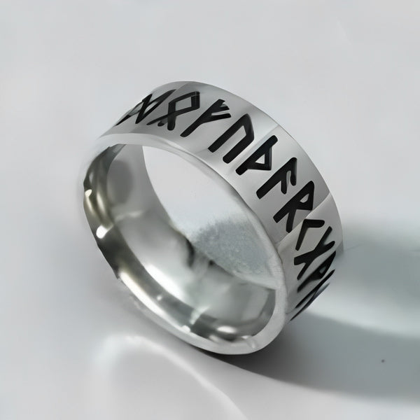 LuminaryLA Men's Titanium Steel Retro Carved Pattern Ring reflecting a timeless style.
