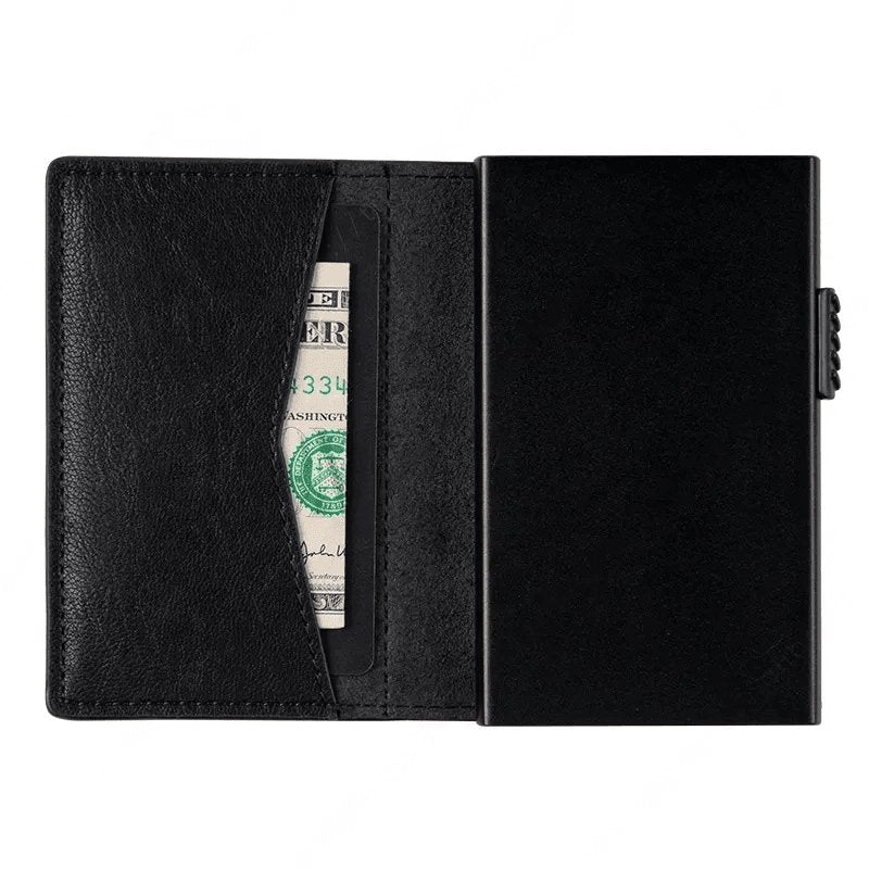 Product shot of LuminaryLA sliding wallet in black leather spread out and floating to show the money pouch and trigger for the card holder against a clean background.